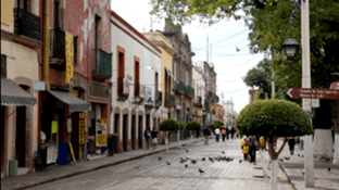 A street with many people walking on it